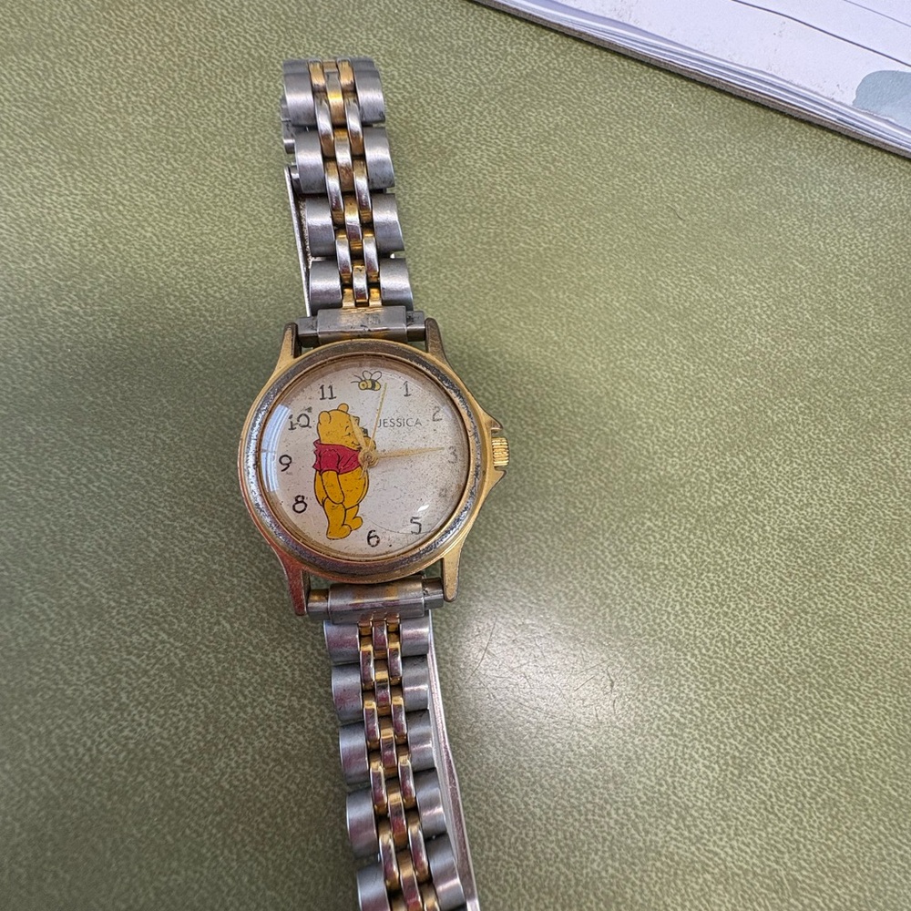 Gold and Silver Watch with Whinie The Pooh and the name Jessica